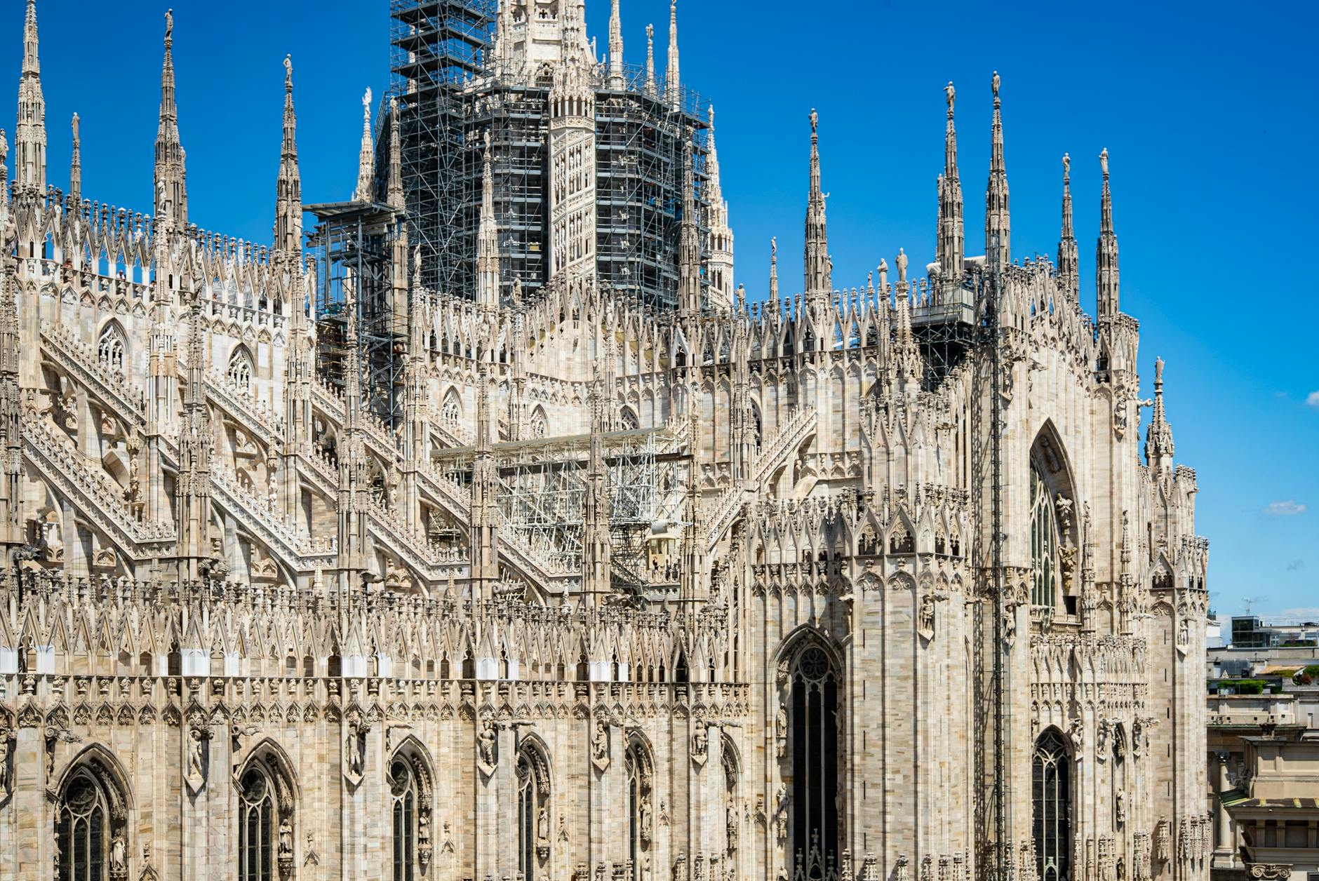 Milan Duomo cathedral stunning Gothic facade in daytime