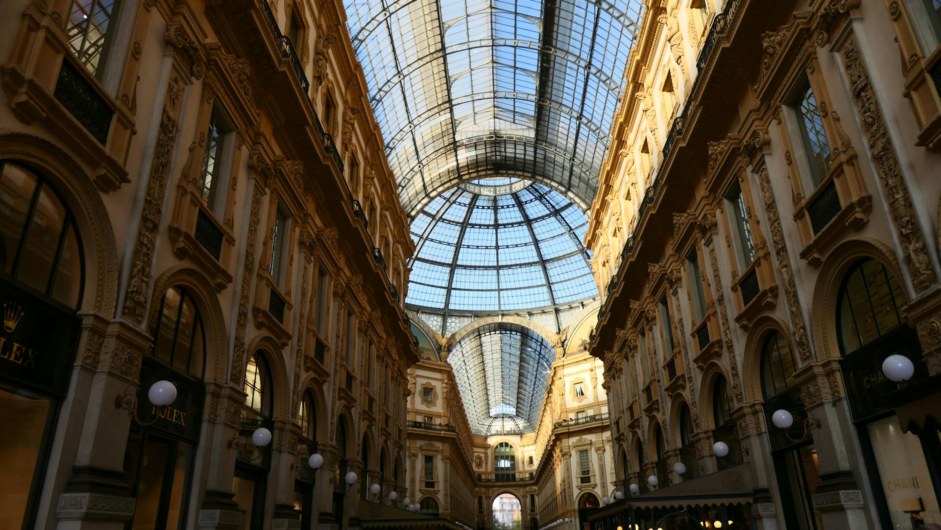 Milan fashion district shopping street with luxury boutiques