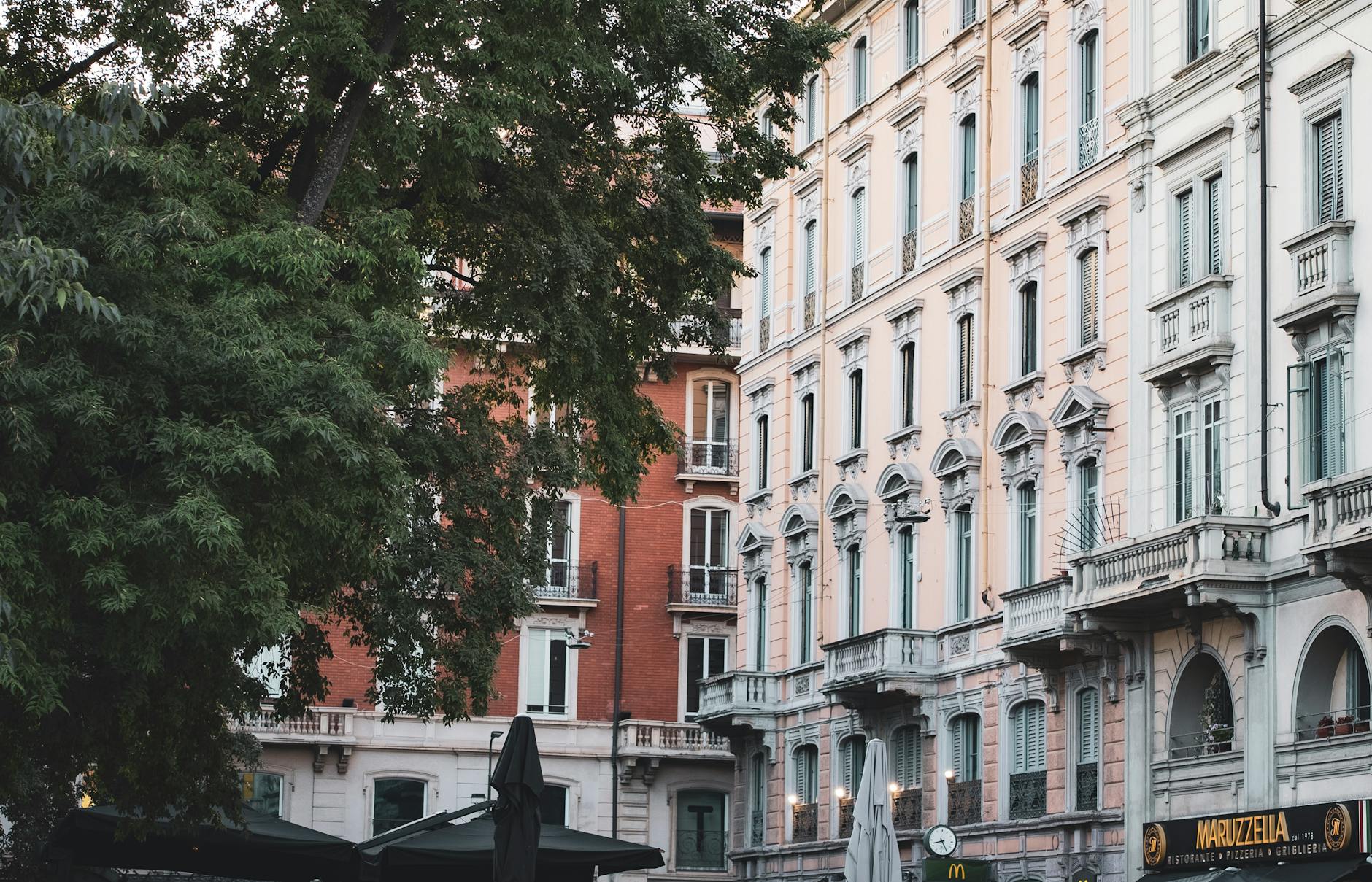 Cozy neighborhood cafe on a Milan street in the morning