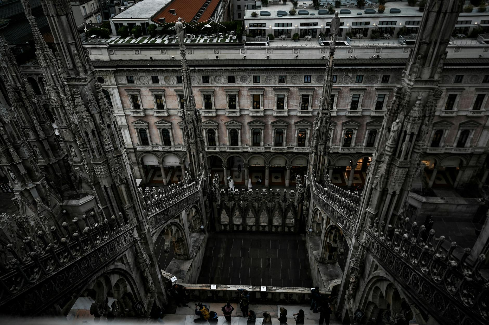 Where to stay in Milan first time - tourists exploring the city centre