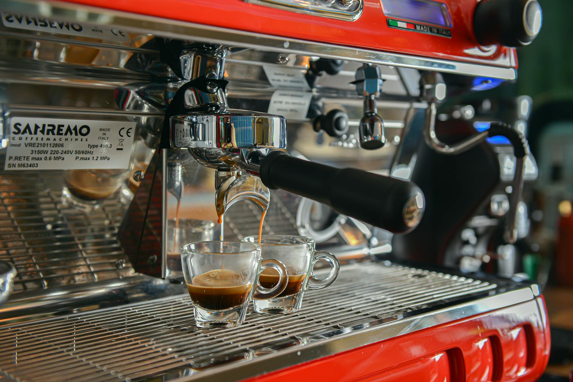 barista pouring espresso italian bar