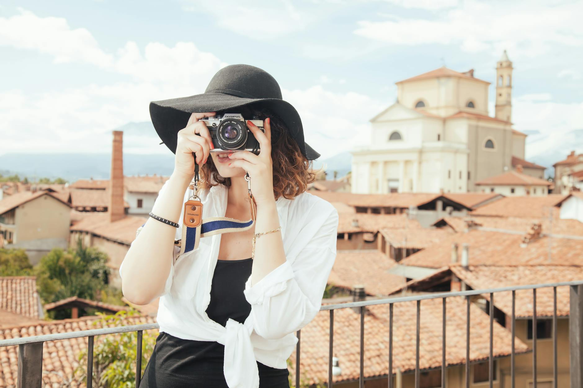 tourist taking photos milan