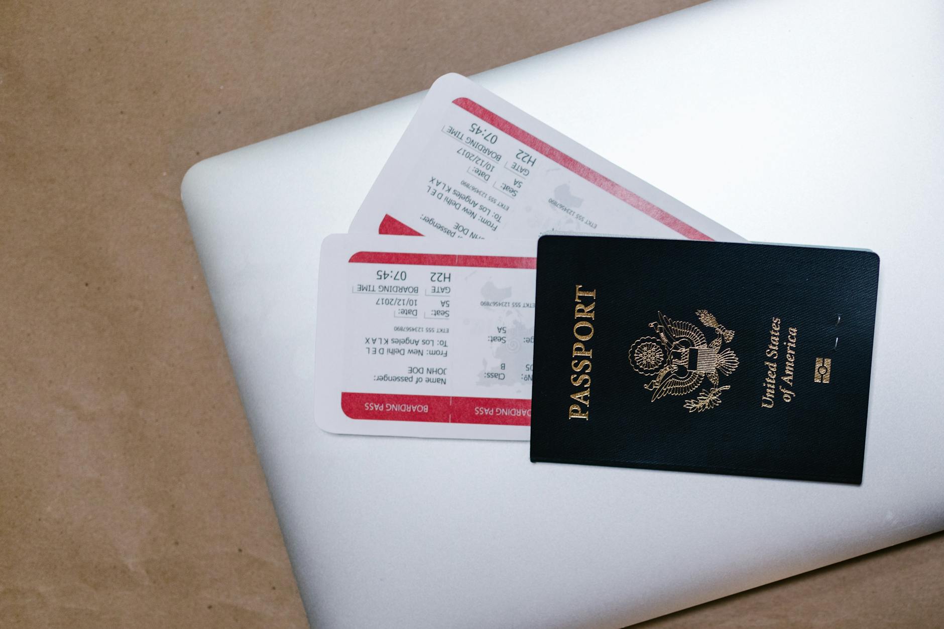 travel insurance documents passport laptop