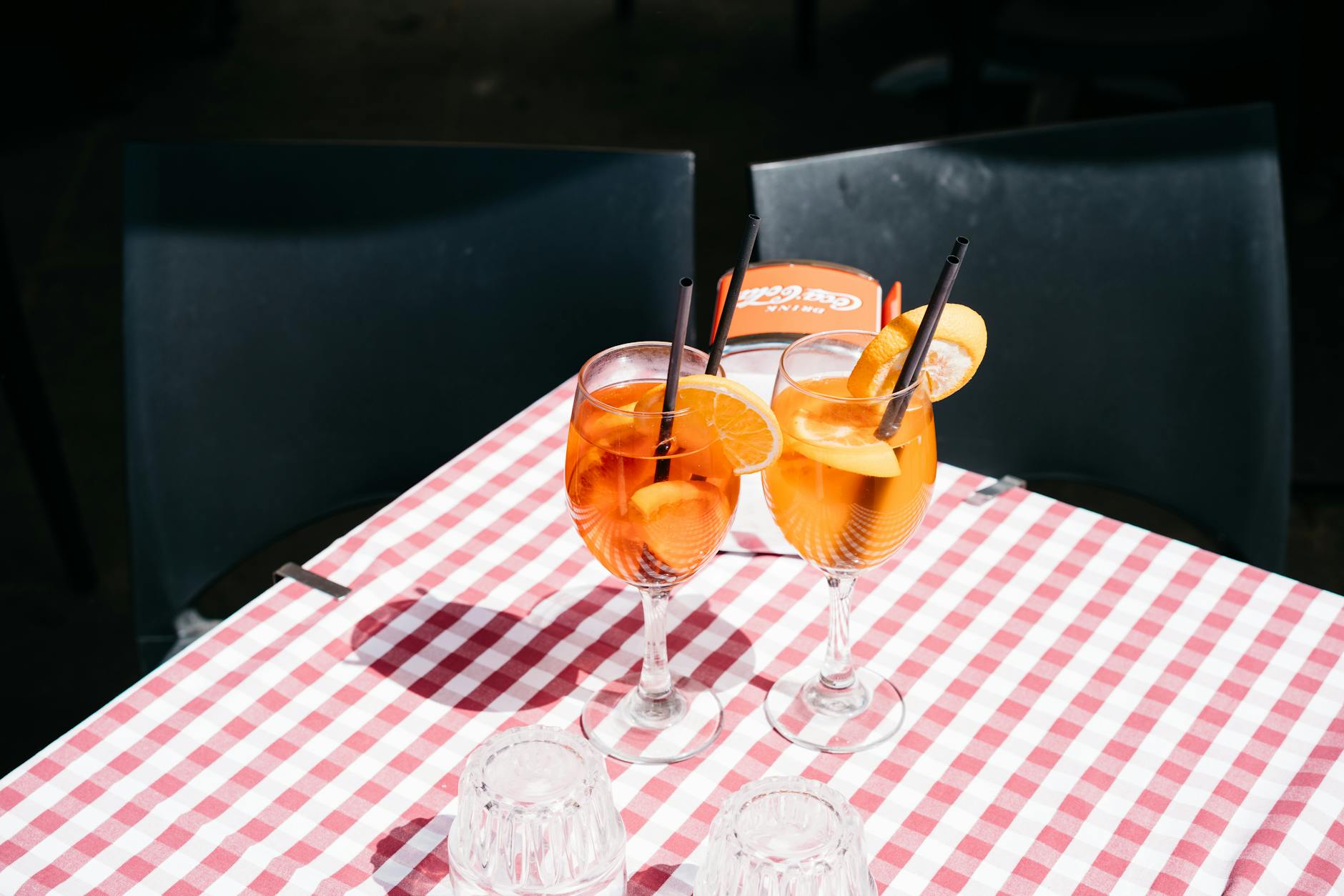 Aperitivo spritz canal-side table Navigli Milan