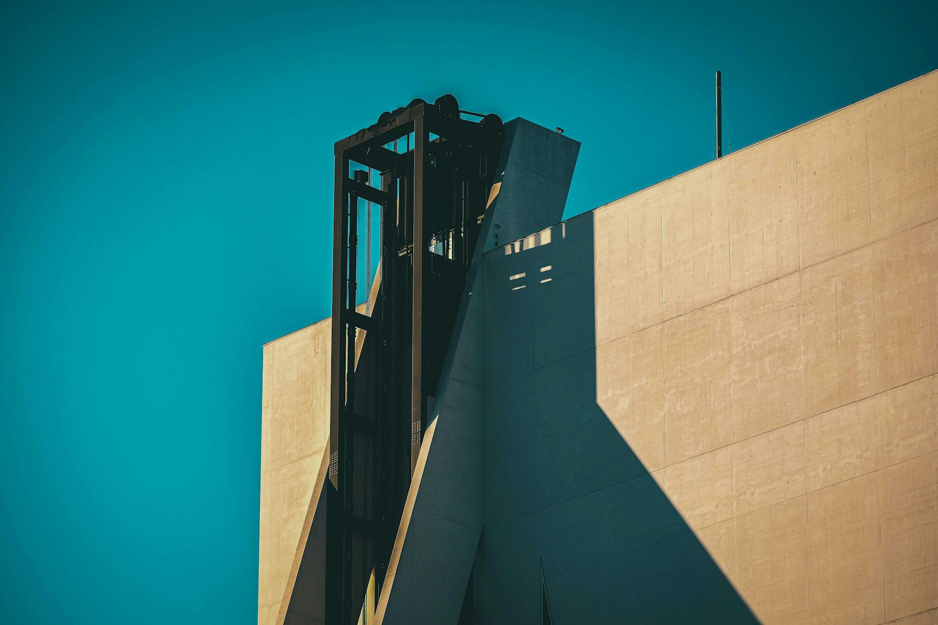 Fondazione Prada Torre Hood gold-leafed exterior with sky behind