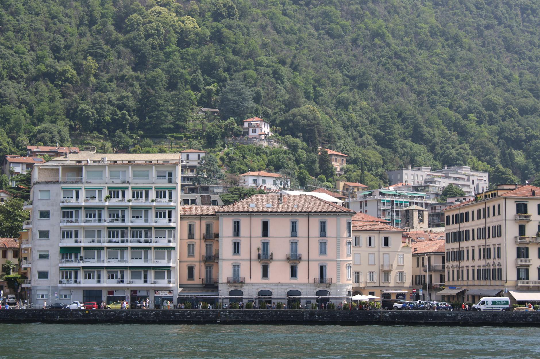 Picturesque view of Lake Como lakeside architecture and mountains