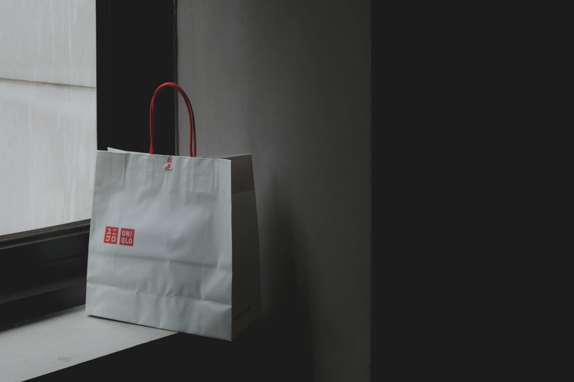 Outlet malls near Milan luxury shopping bags purchase