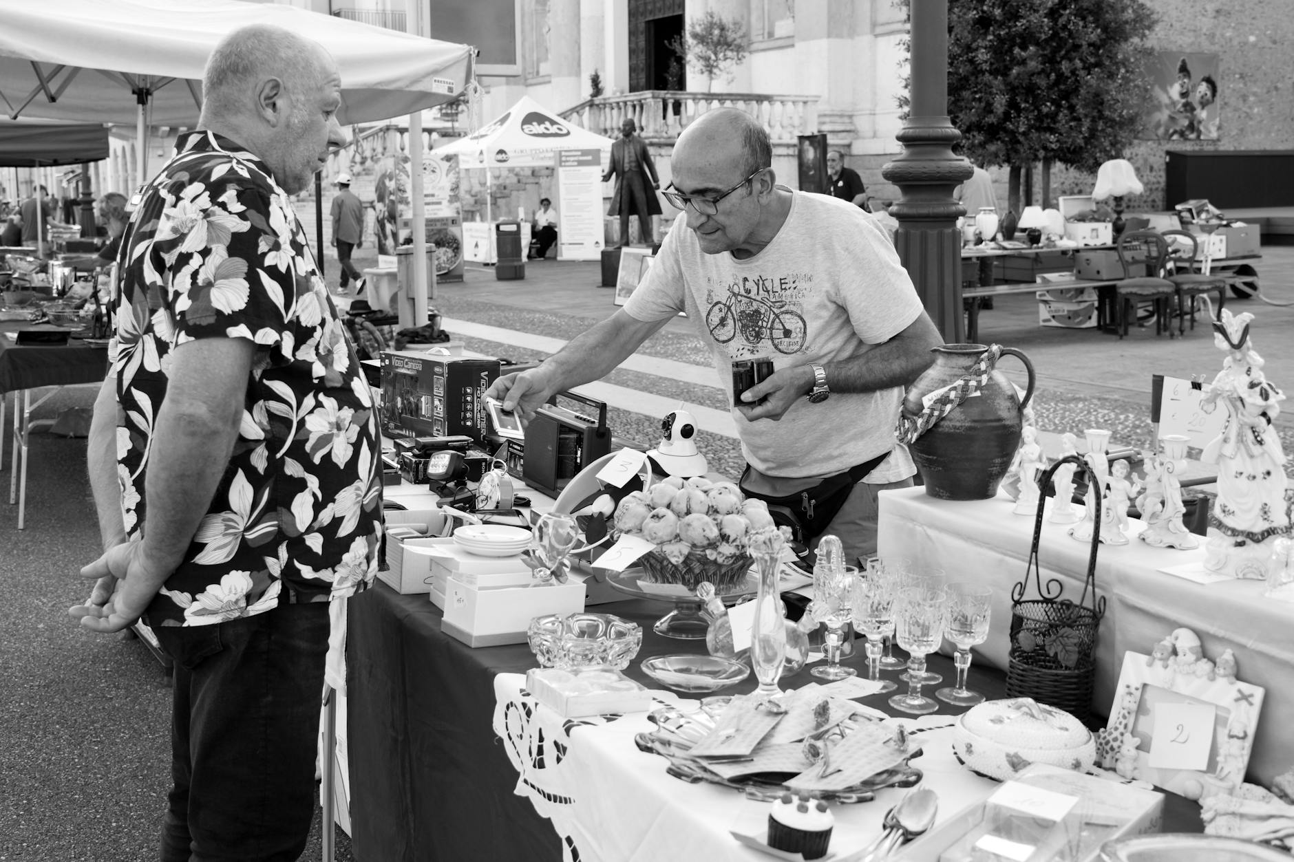 Vibrant Italian flea market with vintage goods and lively atmosphere