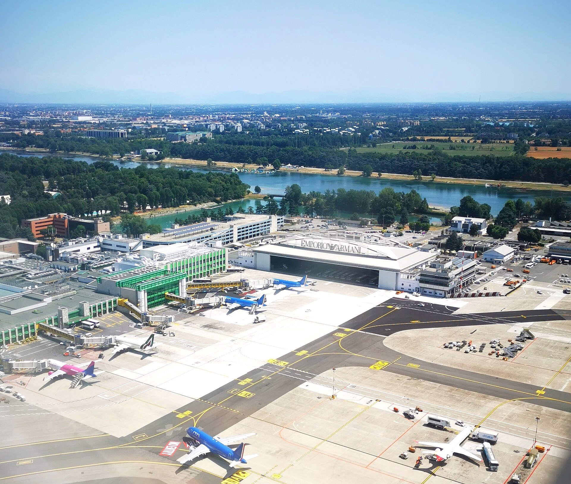 Aerial view of Milan Linate Airport terminal and apron